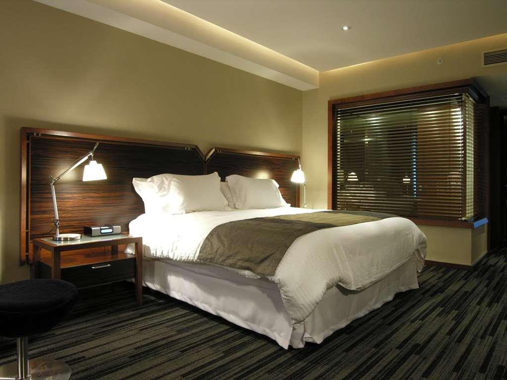 Hotel Dreams Valdivia Phòng bức ảnh A bedroom
