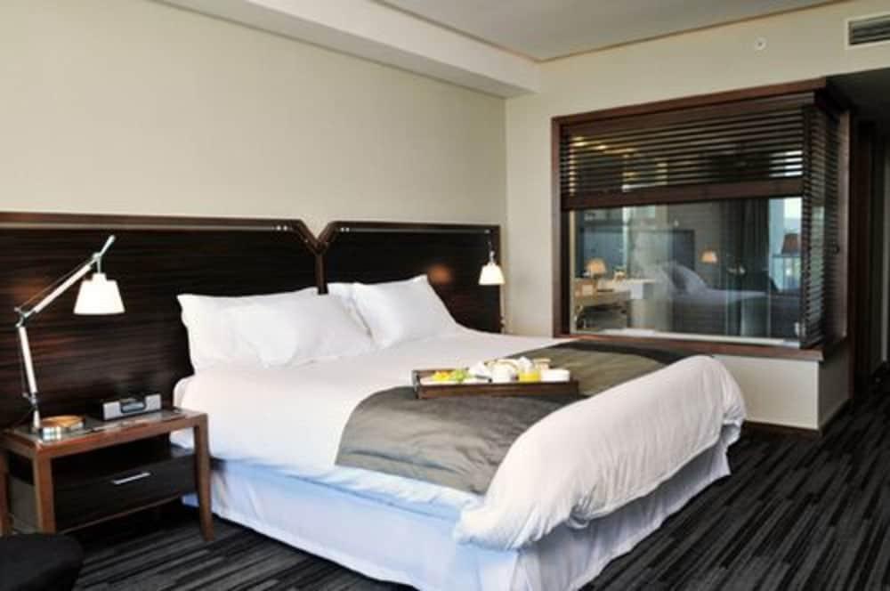 Hotel Dreams Valdivia Ngoại thất bức ảnh A bedroom at the hotel
